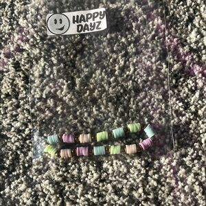 Green and Pink Beaded Jewelry Accessory